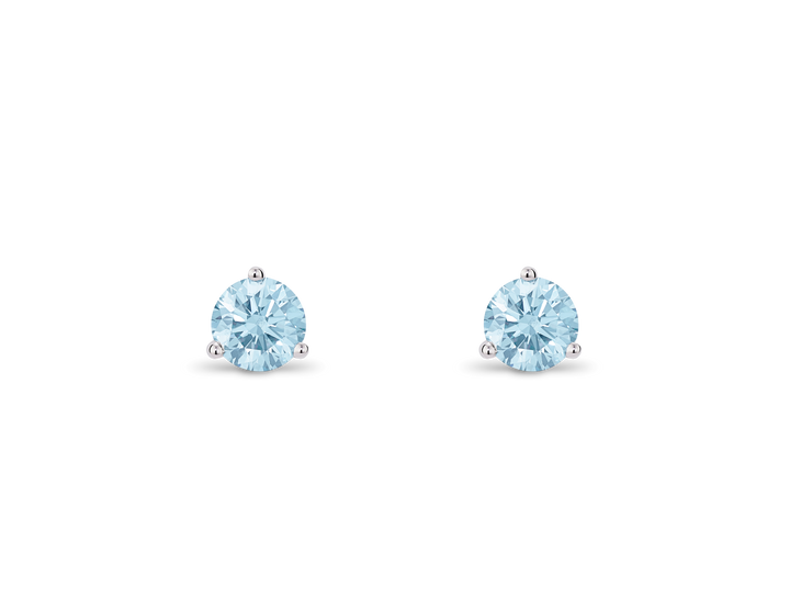 Front view of blue 0.5 carat round brilliant solitaire studs in 14k white gold