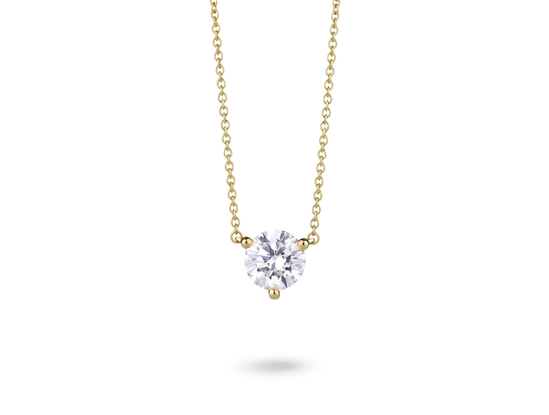 Front view of 14k yellow gold 1 carat solitaire round brilliant pendant with white diamond