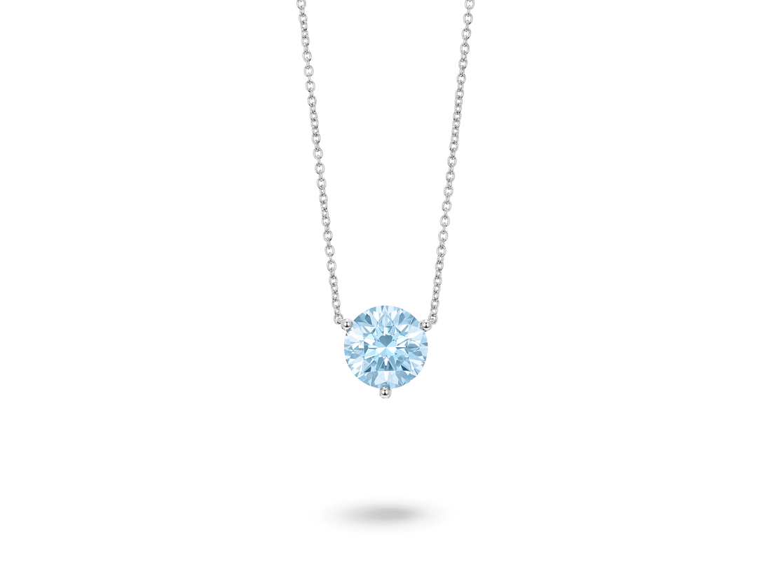 Front view of a blue 2 carat round brilliant pendant in a 14k white gold solitaire setting