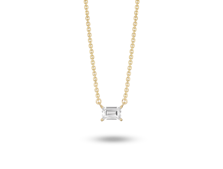 Front view of 0.25 carat baguette cut solitaire pendant in yellow gold